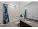 Clean bathroom with granite countertop and shower at 3948 Mossy Limb Ct, Palmetto, FL 34221