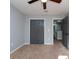 Bedroom with ceiling fan and neutral wall paint at 18141 Sandy Pointe Dr, Tampa, FL 33647