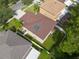 Aerial view of house, yard, and solar panels at 18141 Sandy Pointe Dr, Tampa, FL 33647