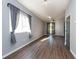 Living room with hardwood floors and sliding glass doors at 18141 Sandy Pointe Dr, Tampa, FL 33647
