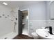 Updated bathroom with walk-in shower and a separate vanity area at 18141 Sandy Pointe Dr, Tampa, FL 33647