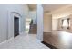 Bright entryway with tiled floor and staircase at 18141 Sandy Pointe Dr, Tampa, FL 33647