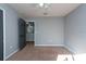 Bright bedroom with carpeted floor and door to additional room at 18141 Sandy Pointe Dr, Tampa, FL 33647