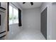 Small pantry with gray walls and tile floor at 18141 Sandy Pointe Dr, Tampa, FL 33647