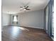 Spacious living room featuring hardwood floors and large windows at 18141 Sandy Pointe Dr, Tampa, FL 33647