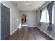 Bright living room with hardwood floors and large windows at 18141 Sandy Pointe Dr, Tampa, FL 33647