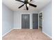 Spacious bedroom with double doors leading to closet at 18141 Sandy Pointe Dr, Tampa, FL 33647