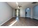 Living room with hardwood floors and access to backyard at 18141 Sandy Pointe Dr, Tampa, FL 33647