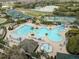 Resort-style pool with lap lanes, water slide, and playground at 18141 Sandy Pointe Dr, Tampa, FL 33647