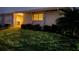 House exterior at night with well-maintained lawn at 3280 Southfield Ln # 804, Sarasota, FL 34239