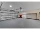 Spacious garage with epoxy flooring and storage at 107 Seville N Ct, Plant City, FL 33566