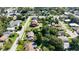 Aerial view of a neighborhood with a large home and pool in the center at 710 W Braddock St, Tampa, FL 33603