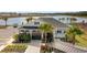 Community clubhouse with a waterfront view and ample parking at 3916 Direct Green Pl, Bradenton, FL 34208