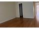 Living room features hardwood floors and an entry to a closet at 2625 State Road 590 # 2514, Clearwater, FL 33759