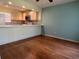 Open dining area with hardwood floors and kitchen views at 2625 State Road 590 # 2514, Clearwater, FL 33759