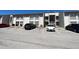 Building exterior with parking lot and several cars at 2625 State Road 590 # 2514, Clearwater, FL 33759