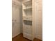 White built-in shelving and drawers in closet at 2625 State Road 590 # 2514, Clearwater, FL 33759