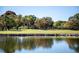 Golf course with water features and trees at 900 Cove Cay Dr # 4B, Clearwater, FL 33760