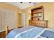 Bright bedroom with hardwood floors and a large closet at 30349 Fairway Dr, Wesley Chapel, FL 33543