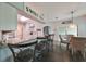 Kitchen with breakfast bar seating and view into the dining area at 10926 Sailbrooke Dr, Riverview, FL 33579