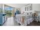 Bright bedroom with wood-look floors and a view at 800 Cove Cay Dr # 3C, Clearwater, FL 33760