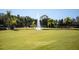 Golf course with fountain and lush green grass at 800 Cove Cay Dr # 3C, Clearwater, FL 33760