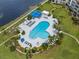 Resort-style pool with plenty of lounge chairs and shade at 5153 Isla Key S Blvd # 412, St Petersburg, FL 33715