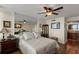 Spacious bedroom featuring a ceiling fan and hardwood floors at 5153 Isla Key S Blvd # 412, St Petersburg, FL 33715