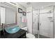 Clean bathroom with walk-in shower, glass enclosure, and modern vanity at 5153 Isla Key S Blvd # 412, St Petersburg, FL 33715