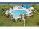 Relaxing community pool with ample lounge chairs and shade structures at 5153 Isla Key S Blvd # 412, St Petersburg, FL 33715
