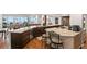 Spacious kitchen with granite countertops, stainless steel appliances, and hardwood floors at 5153 Isla Key S Blvd # 412, St Petersburg, FL 33715