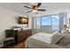 Serene bedroom with stunning water views and a dresser at 5153 Isla Key S Blvd # 412, St Petersburg, FL 33715
