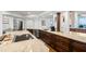 Eat-in kitchen with granite countertops, stainless steel appliances, and hardwood floors at 5153 Isla Key S Blvd # 412, St Petersburg, FL 33715