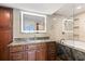 Bathroom with granite countertop, modern vanity, and soaking tub at 5153 Isla Key S Blvd # 412, St Petersburg, FL 33715