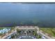 Aerial view of waterfront condo community with pool and parking at 5153 Isla Key S Blvd # 412, St Petersburg, FL 33715