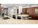 Island kitchen features granite countertops, stainless steel appliances, and custom cabinetry at 5153 Isla Key S Blvd # 412, St Petersburg, FL 33715