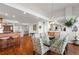 Elegant dining room with glass table and patterned chairs at 5153 Isla Key S Blvd # 412, St Petersburg, FL 33715