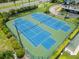 Two well-maintained tennis/pickleball courts at 5153 Isla Key S Blvd # 412, St Petersburg, FL 33715