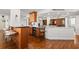 Open kitchen with granite counters and wood cabinets at 5153 Isla Key S Blvd # 412, St Petersburg, FL 33715