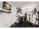 Well-equipped exercise room with various workout machines and storage for bikes at 5153 Isla Key S Blvd # 412, St Petersburg, FL 33715
