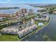 Aerial view of waterfront condo community with pool and parking at 5153 Isla Key S Blvd # 412, St Petersburg, FL 33715