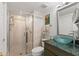 Bathroom with walk-in shower, glass enclosure, and modern vanity at 5153 Isla Key S Blvd # 412, St Petersburg, FL 33715