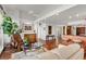 Open living space with hardwood floors and kitchen access at 5153 Isla Key S Blvd # 412, St Petersburg, FL 33715