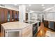 Large kitchen island with granite countertops and stainless steel appliances at 5153 Isla Key S Blvd # 412, St Petersburg, FL 33715