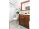 Bathroom with wood vanity and shower/tub combo at 6515 Los Altos Way, Tampa, FL 33634