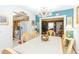 Bright dining room with a chandelier and seating for six at 6515 Los Altos Way, Tampa, FL 33634