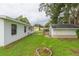 Large backyard with shed and grassy area at 6515 Los Altos Way, Tampa, FL 33634