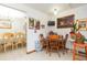 Small dining area with wood table and chairs near the kitchen at 6515 Los Altos Way, Tampa, FL 33634
