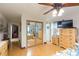 Bedroom with mirrored closet and view into living room at 6515 Los Altos Way, Tampa, FL 33634
