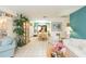 Spacious living room with decorative artwork and a view to the dining area at 6515 Los Altos Way, Tampa, FL 33634